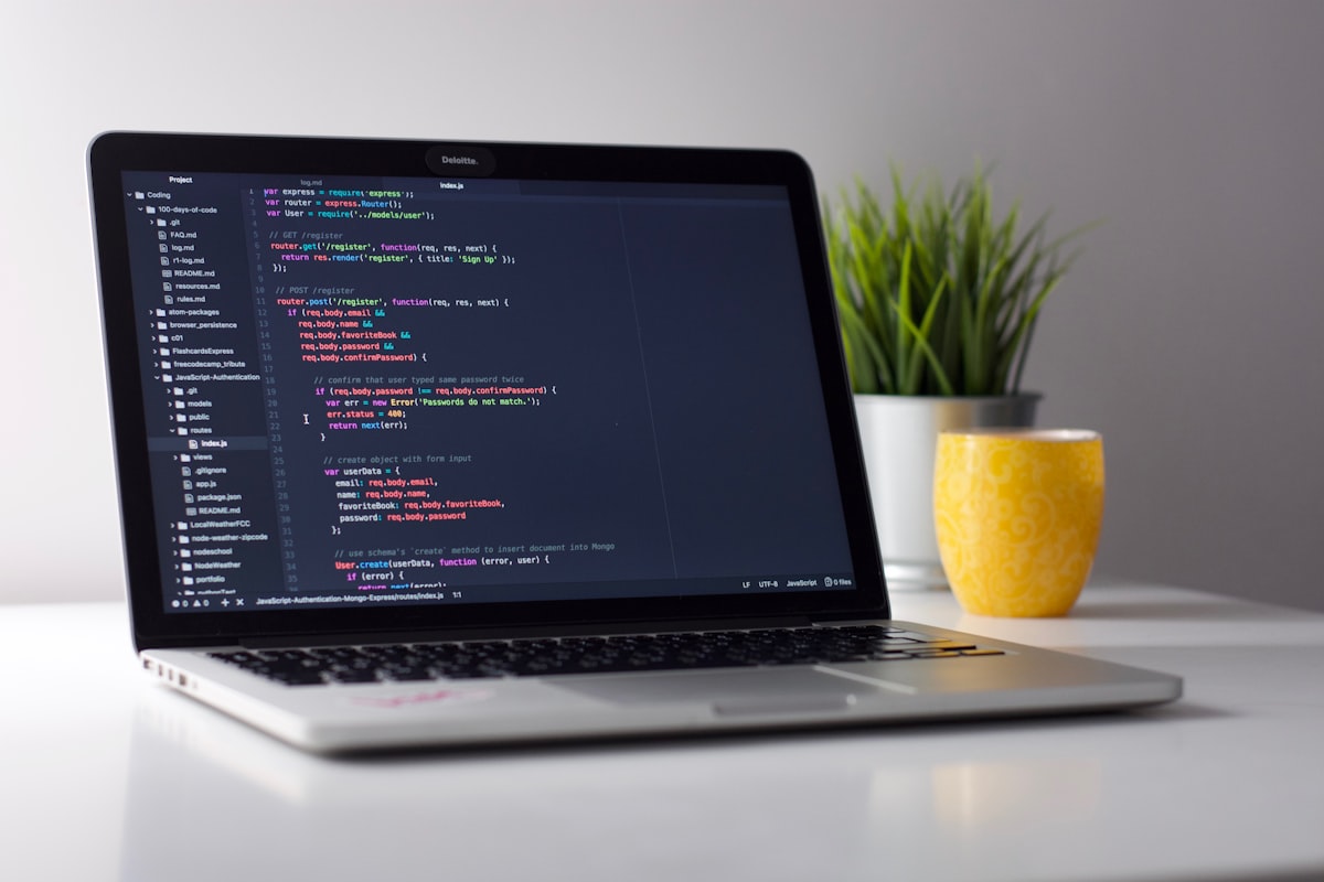 Laptop with code on screen — placeholder stock photo